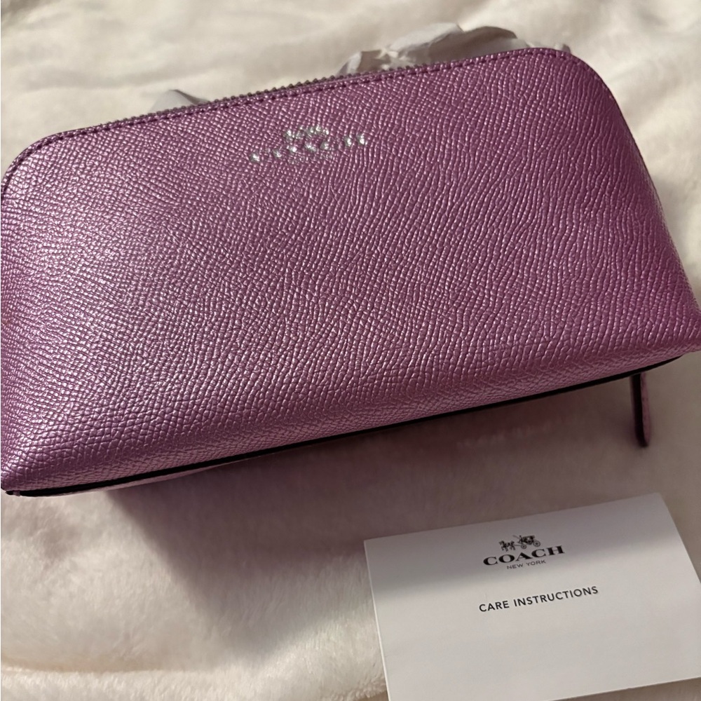 Coach Purple Metallic Cosmetic Bag
A metallic lilac almost
Final sale